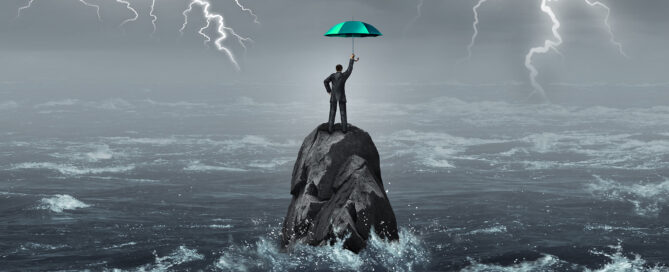 A person in a suit stands on a lone rock surrounded by rough ocean waves, holding a teal umbrella upward while lightning strikes across a dark stormy sky.